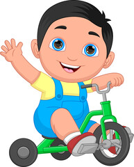 little boy riding a tricycle and waving