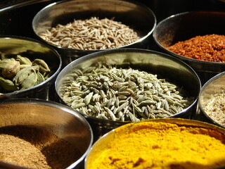 indian spices, colorful in containers