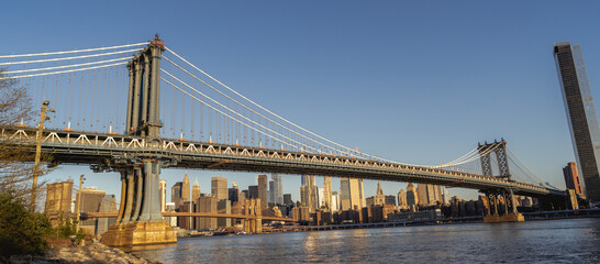 Fototapeta na wymiar Manhattan bridge over the river Brooklyn New York panoramic urban travel morning beautiful 
