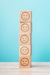 emotion face blocks on blue background. Service rating, ranking, customer review, satisfaction,...