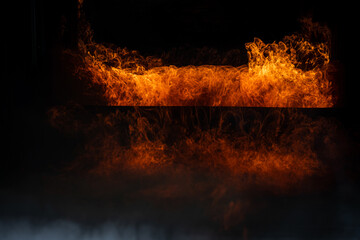 Burning red hot sparks rise from large fire,Perfect fire particles embers on background,Smoke fog...