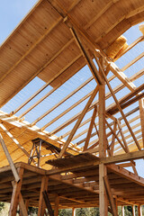 Fototapeta premium Construction of a frame wooden house