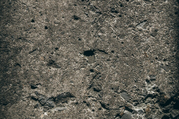 Close-up of the old concrete pavement. Dirty concrete floor. The texture of old concrete.