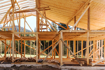 Frame wooden building in the process of construction