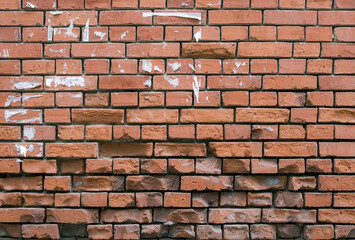 A brocken old brick wall colored background