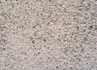 A background of small stones textured wall