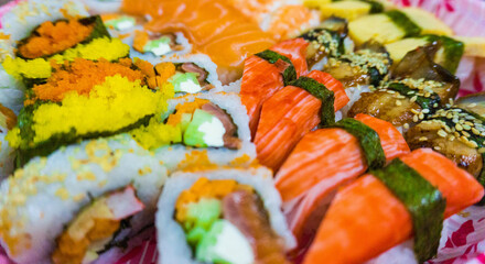 Japanese sushi food. Salmon, shrimp, herring, tuna, crab sticks..Various of sushi cuisine : Urakami, maki, nigiri, masago