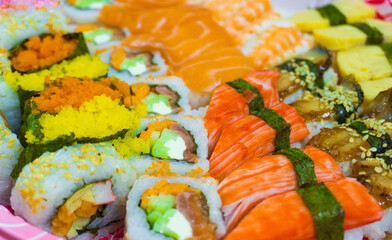 Japanese sushi food. Salmon, shrimp, herring, tuna, crab sticks..Various of sushi cuisine : Urakami, maki, nigiri, masago