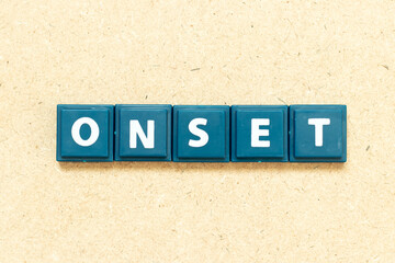 Tile alphabet letter in word onset on wood background