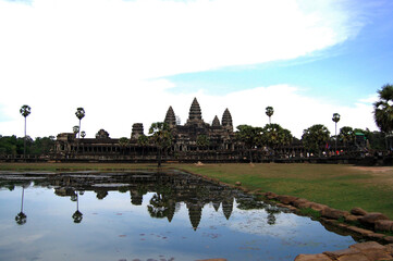 Fototapeta na wymiar Ancient ruins antique building castle Khmer Empire of Angkor Wat for cambodian people and foreign travelers travel visit respect praying in largest religious temple city complex in Siem Reap, Cambodia