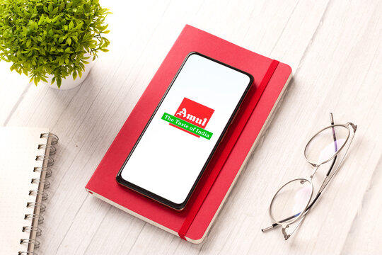 West Bangal, India - October 09, 2021 : Amul logo on phone screen stock image.
