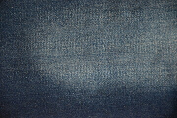 The background or texture of gray denim