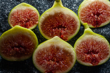 Organic ripe figs sliced in half