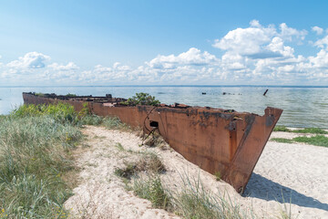 Rusted ORP Wicher (English: Whirlwind) wreck on Hel peninsula. - obrazy, fototapety, plakaty