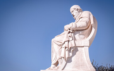 Plato the ancient Greek philosopher marble statue under blue sky background, space for your text