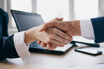 shaking hands deal successful office work business