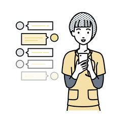 立ってスマートフォンで楽しくチャットで会話する看護師の女性