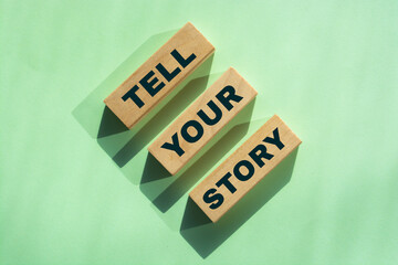 Tell your story word on wooden blocks. Testimonial examples storytelling copywriting case study education and business concept.