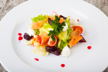 salad with salmon vegetables with sweet sauce