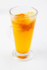 hot berry drinks in a glass glass on a white background