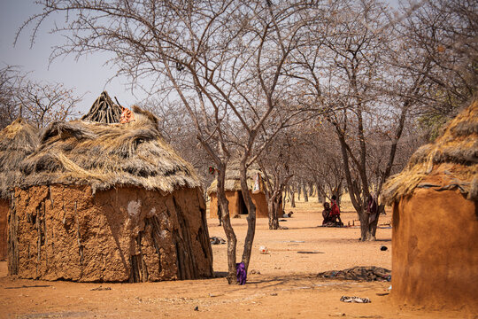 Himba village, huts made from a mixture of clay, cow dung, wood and straw. Namibia