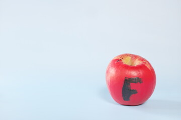 Fake food, coloring, fraud and fraudulent food concept. Apple painted red.