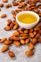 Natural fresh almond oil in a bowl