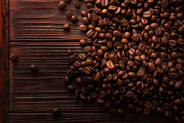 Fresh roasted beans on a wooden table