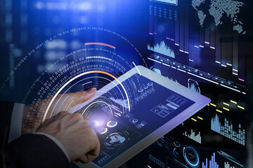 Businessman with tablet, hud with earth map and diverse digital icons