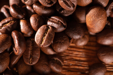 Fresh roasted beans on a wooden table