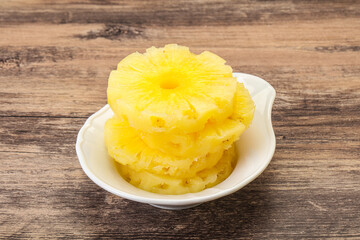 Sweet pineapple rings in the bowl