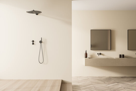 Shower room interior with beige walls and parquet floor