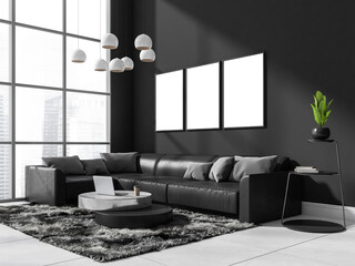 Dark living room interior with sofa and coffee table near window, mockup posters