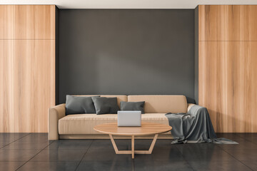 Beige sofa in dark living room interior with coffee table, mockup