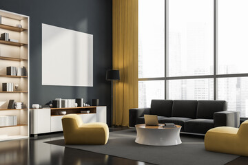 Corner of grey and yellow living room with white poster on wall