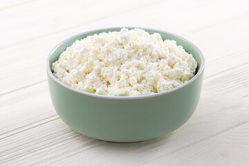 Pure cottage cheese in a bowl