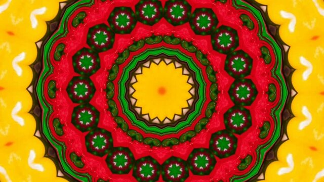 A kaleidoscopic futuristic wallpaper in vibrant green, yellow and red colors
