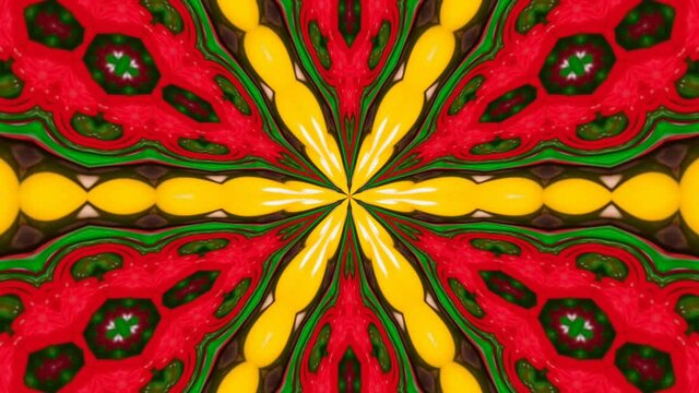 A kaleidoscopic futuristic wallpaper in vibrant green, yellow and red colors