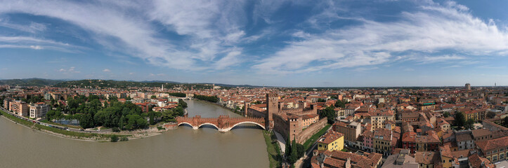 Aerial panorama of the famous Ponte di Castelvecchio in Verona. Unesco Monument Scaliger Bridge in...