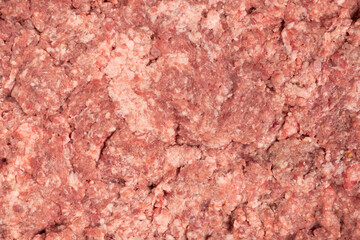 Raw minced meat texture background. Chopped meat background.  fresh raw ground pork heap. Top view