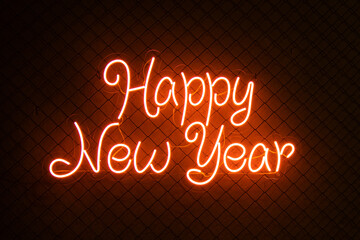 orange colored lifht bright neon text Happy New Year