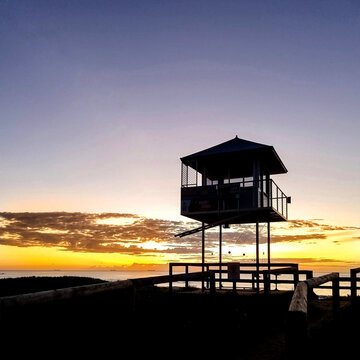 lifeguard tower at sunset © Michelle