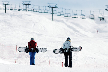 Fototapeta na wymiar Snowboard and ski on dolomites
