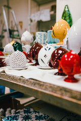 Series of objects (souvenirs) for sale in a typical ceramic shop in Grottaglie