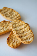 Cardamom rusks on white background