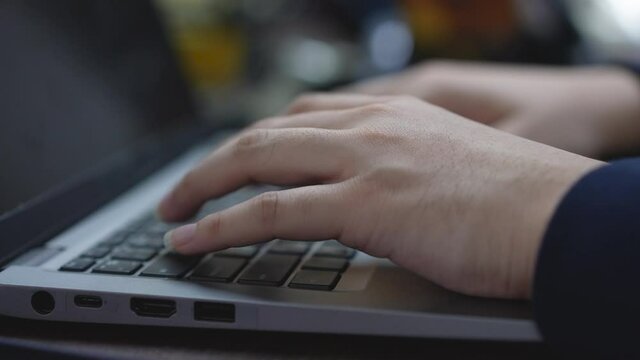 specialist programmer hand typing on keyboard on laptop check or command on software for run system at operation data center office for network engineering technology concept