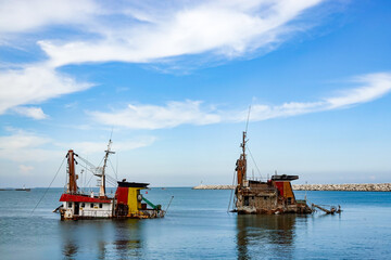 An old sunken ship in the harbor