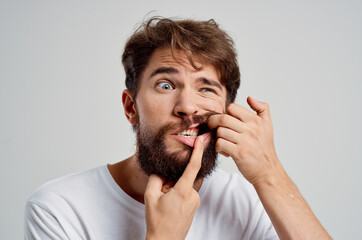 bearded man dental problem dentistry treatment isolated background