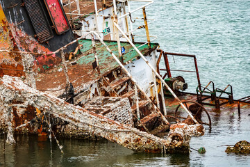 An old sunken ship in the harbor