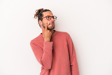 Young caucasian man isolated on white background crying, unhappy with something, agony and confusion concept.